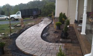Landscape work being done on a walkway